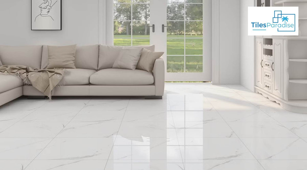 Large format white marble effect porcelain floor tiles across an open-plan ground floor with modern seating