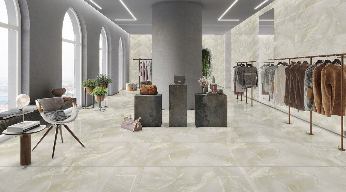 Ivory Pearl 60x120cm polished onyx effect porcelain tiles on the floor and walls of a bright boutique-style room with arched windows