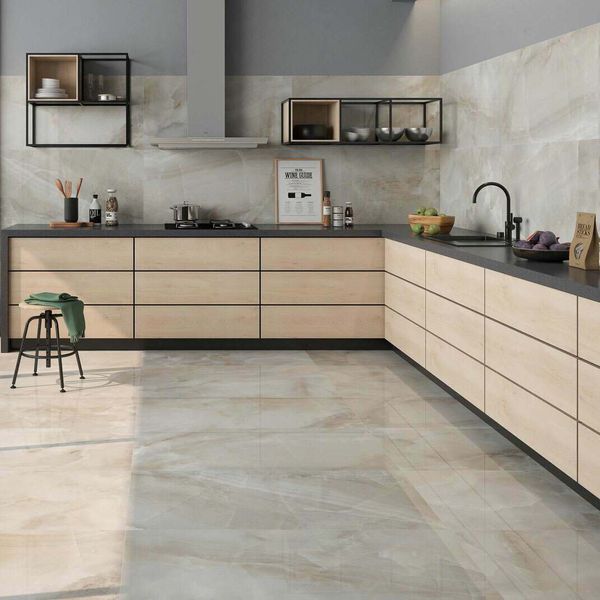 Modern kitchen interior featuring glossy beige kitchen porcelain tiles with sleek cabinets and stylish finish.