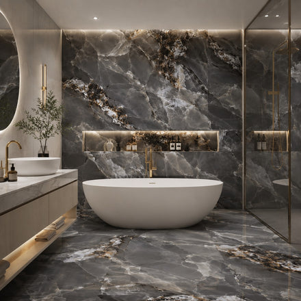 A luxury modern bathroom featuring a freestanding oval white bathtub in front of a large dark gray marble wall with gold veining, matching marble flooring, a floating vanity with a white vessel sink, and a glass shower enclosure.