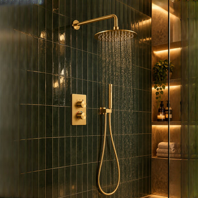 Orbis brushed gold concealed shower set on dark green vertical metro tiles, rainfall head running