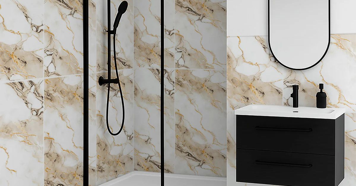 "Modern bathroom with elegant marble tiles, black shower frame, and sleek black vanity with white sink and oval mirror."