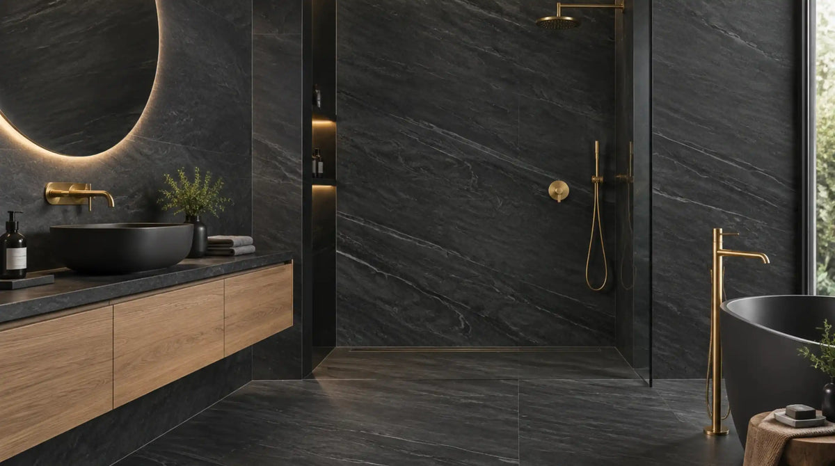 Matt black porcelain bathroom with large format wall tiles, brushed brass brassware and a floating oak vanity