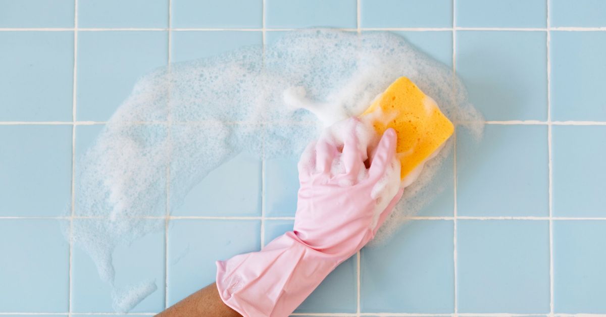 "Learn how to clean bathroom tiles with a sponge and soap for a sparkling, fresh look in your bathroom."