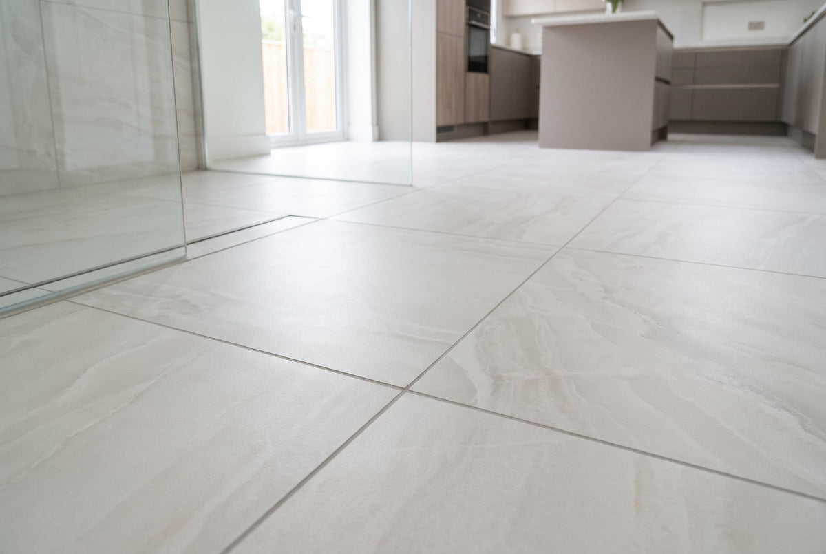 Close-up of Gemstone Onyx White Matt Anti-Slip 60x60cm rectified porcelain floor tile highlighting its low-glare slip-resistant surface and delicate white onyx veining