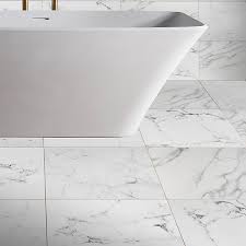 Luxury white marble effect tiles for bathroom wall and floor – elegant porcelain finish for modern interiors.