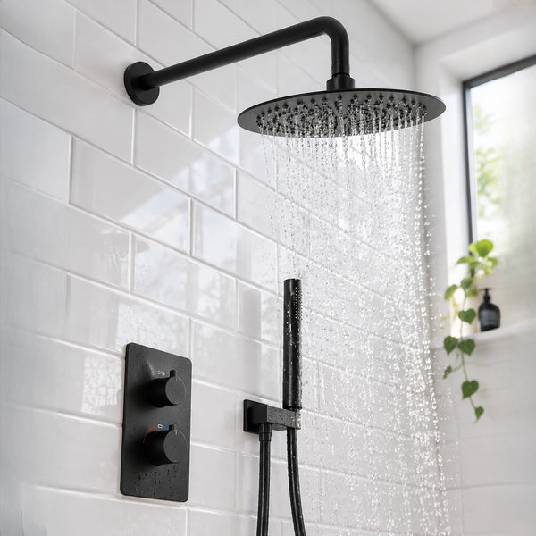 Orbis matt black concealed shower set with round rainfall head running over white metro tiles